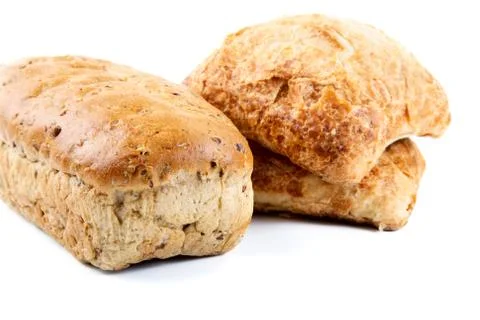 Bread and rolls isolated on a white Stock Photos