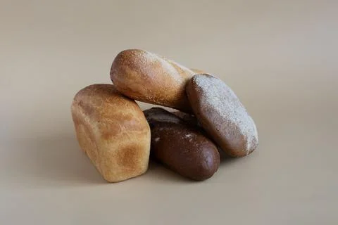 Bread and rolls made from wheat and rye flour in close-up Stock Photos