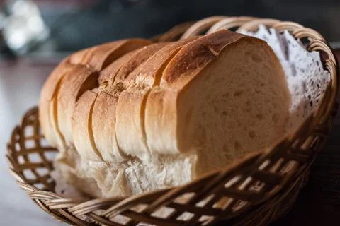 Bread and rolls in wicker basket Stock Photos