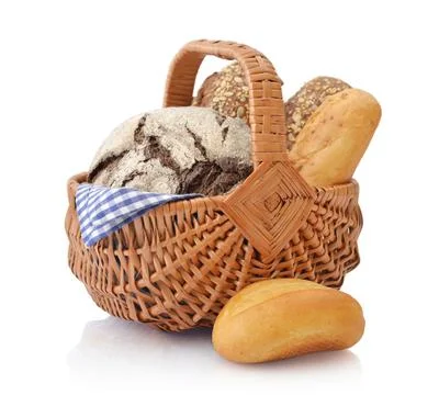 Bread and rolls in wicker basket Stock Photos