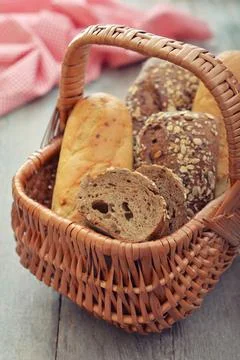 Bread and rolls in wicker basket 写真素材
