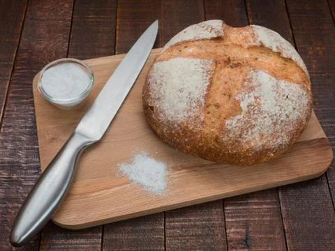 Bread and salt. Prepared according to the classic recipe in the oven. Stock Photos