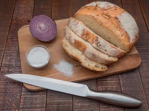 Bread and salt. Prepared according to the classic recipe in the oven. Stock Photos
