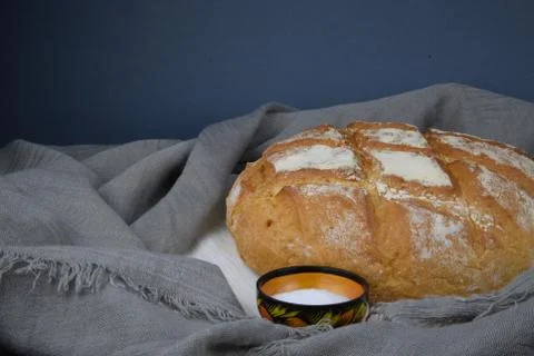 Bread and salt on the rustic background Stock Photos