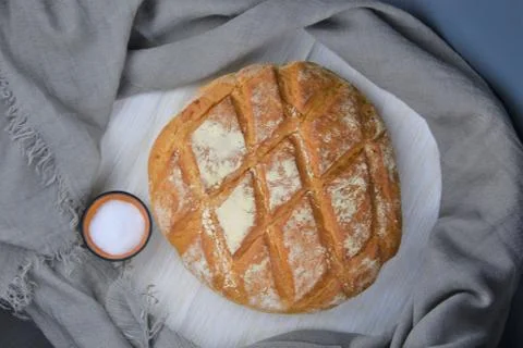 Bread and salt on the rustic background Stock Photos