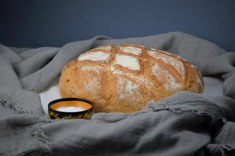Bread and salt on the rustic background Stock Photos
