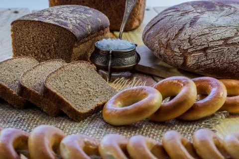 Bread and salt on the table Stock Photos