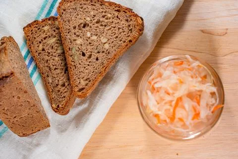 Bread and salted cabbage top view. selective focus Stock Photos