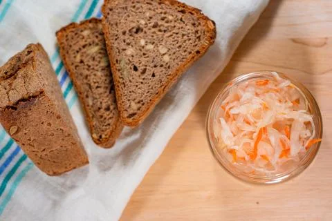 Bread and salted cabbage top view. selective focus Stock Photos