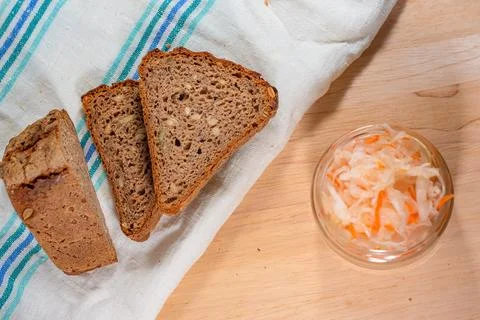 Bread and salted cabbage top view. selective focus Stock Photos