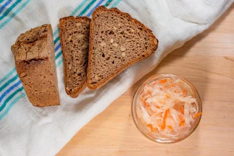 Bread and salted cabbage top view. selective focus Stock Photos