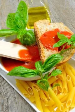 Bread and tomato sauce Stock Photos