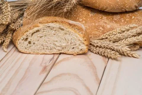 Bread and wheat ears Stock Photos