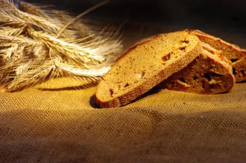 Bread and wheat ears Stock Photos