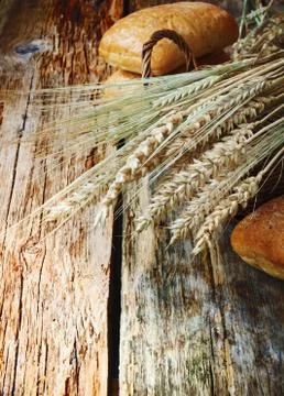 Bread and wheat ears Stock Photos