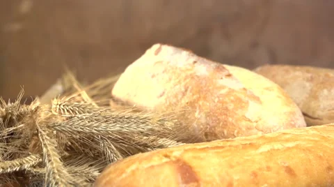 Bread and wheat ears on the table. 스톡 동영상 54700657