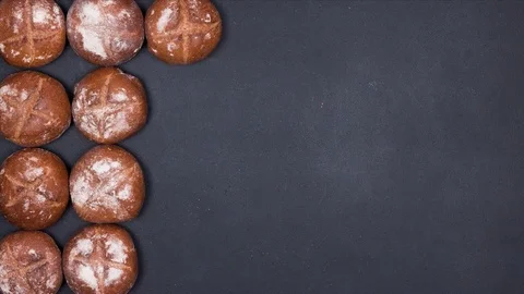 Bread Appears on The Black Bakery Table. There Are a Lot of Buns. 스톡 동영상 74852516