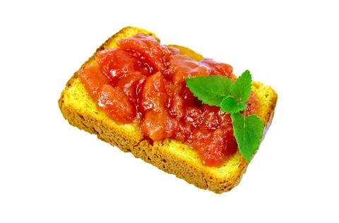 Bread with apple or pear jam Slice of bread with apple or pear jam, mint i... Stock Photos