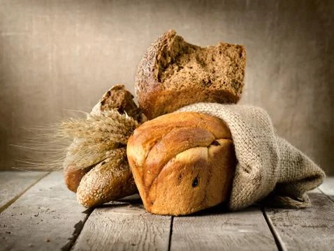 Bread in assortment and wheat Stock Photos