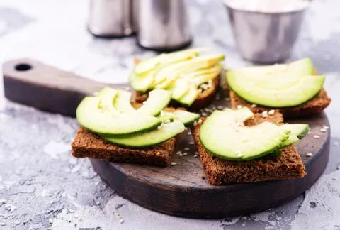 Bread with avocado Stock Photos
