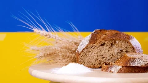 Bread on the background of the flag of Ukraine Stock-Footage 201938205