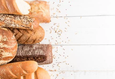 Bread background. various types and forms of delicious fragrant bread on wh.. 스톡 사진