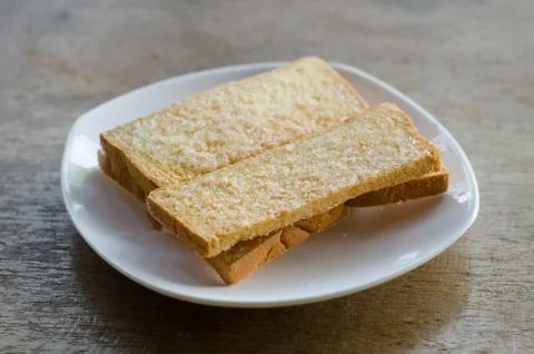 Bread  bake on white dish Stock Photos