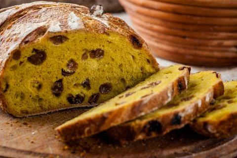 Bread. Baked bread. Craft bakery. Sliced bread on a wooden background. Food b Stock Photos