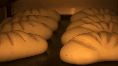 Bread is baked in the oven Stock Footage 119370661