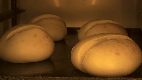 Bread is baked in the oven Stock Footage 119370869