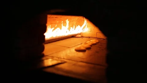 The bread is baked in the stove. Bakery 動画素材 94467144