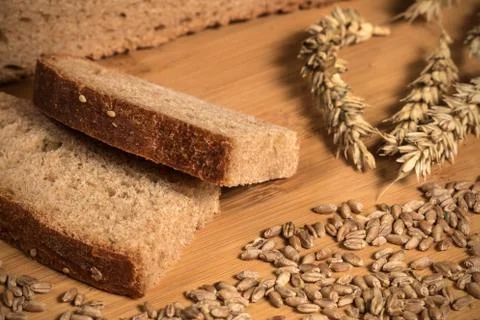 Bread Bakery Background. Wheat Bread And Grain Ears Stock Photos