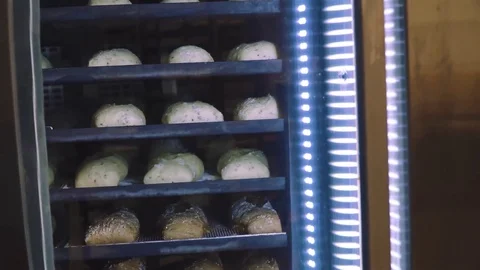 Bread bakery slide up at bread factory close up good light Stock Footage 73374219