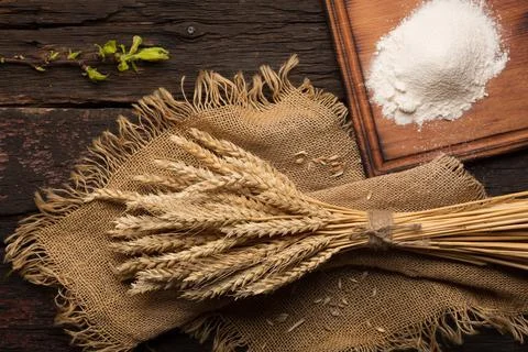 Bread baking bakery concept. Eggs, flour, spikelets on a wooden antique table Stock-Fotos