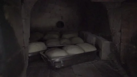 Bread Baking in a Brick Oven in Nature Slow-Mo Video stock 157636417