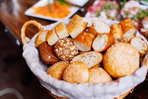 Bread in basket on the banquet table Stock Photos