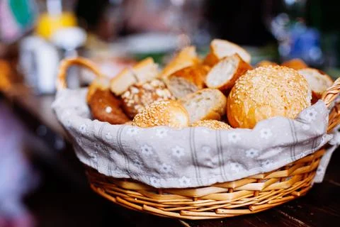 Bread in basket on the banquet table Stock Photos