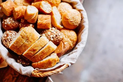 Bread in basket on the banquet table Stock Photos