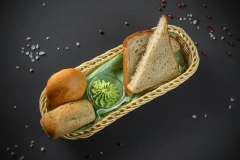Bread basket on dark Stock Photos