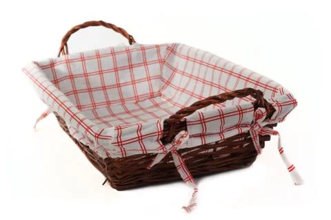 Bread basket isolated over white with focus on an handle Foto stock