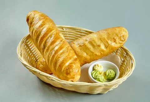 Bread in a basket isolated Stock Photos