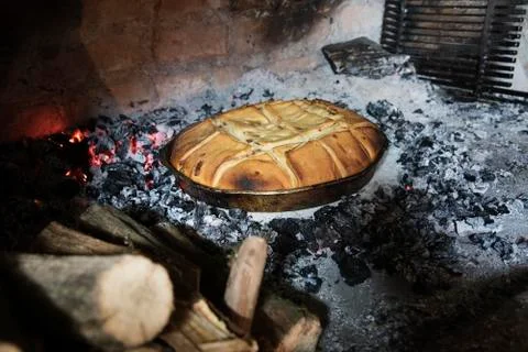 Bread being baked in a Fire Bread Oven Stock Photos