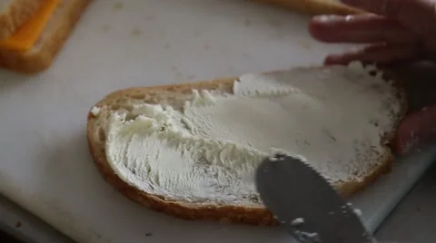 Bread Being Buttered 1080p HD Stock Footage 53111248