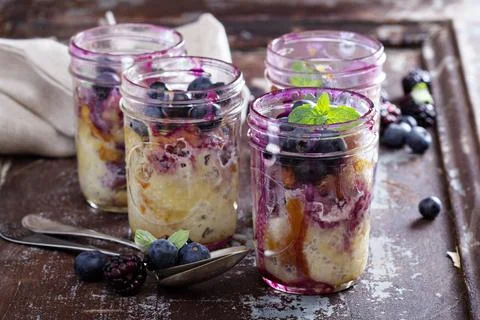 Bread berry pudding in mason jars Stock Photos