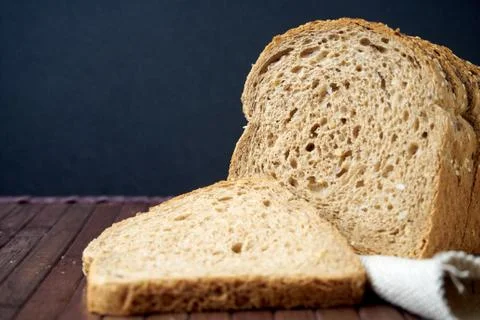 The bread on black background Stock Photos
