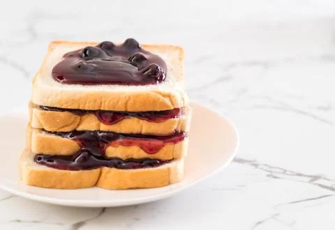 Bread with blueberry jam Stock Photos