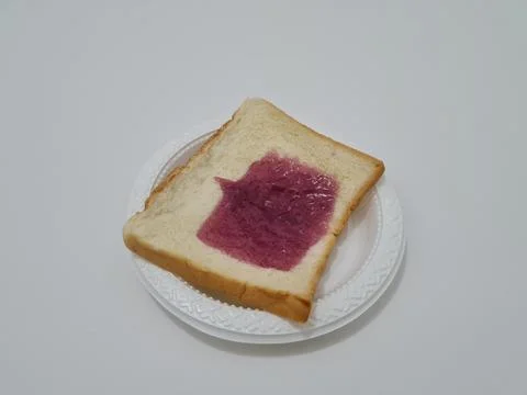 Bread with blueberry jam Stock Photos