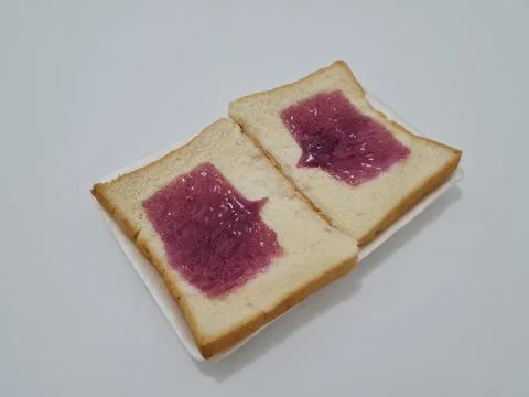 Bread with blueberry jam Stock Photos