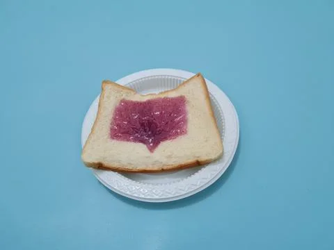 Bread with blueberry jam Stock Photos