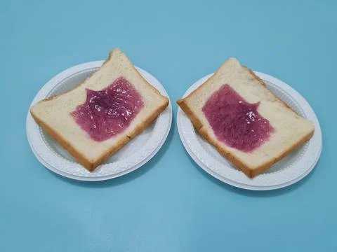 Bread with blueberry jam Stock Photos